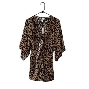 Chic Black and Tan Twist Front Romper